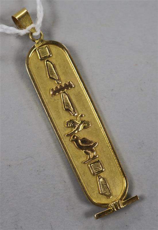 An Egyptian high carat gold hieroglyphic pendant, 43mm.